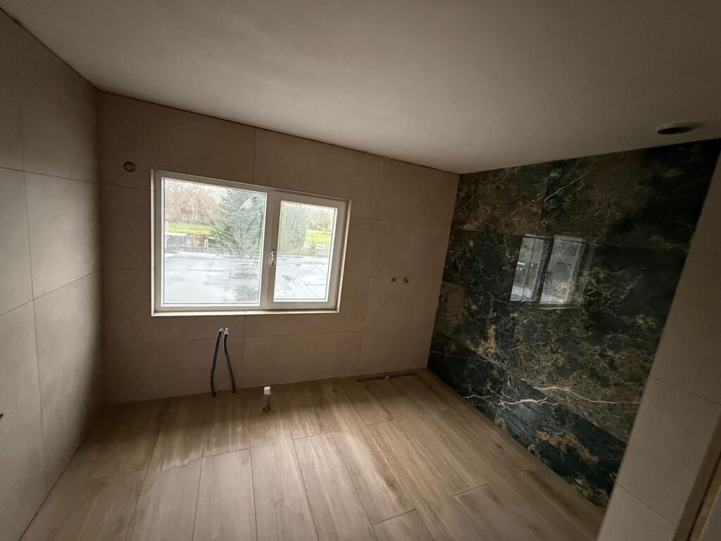 Schilderwerk en wandafwerking door Kurabi Afbouw